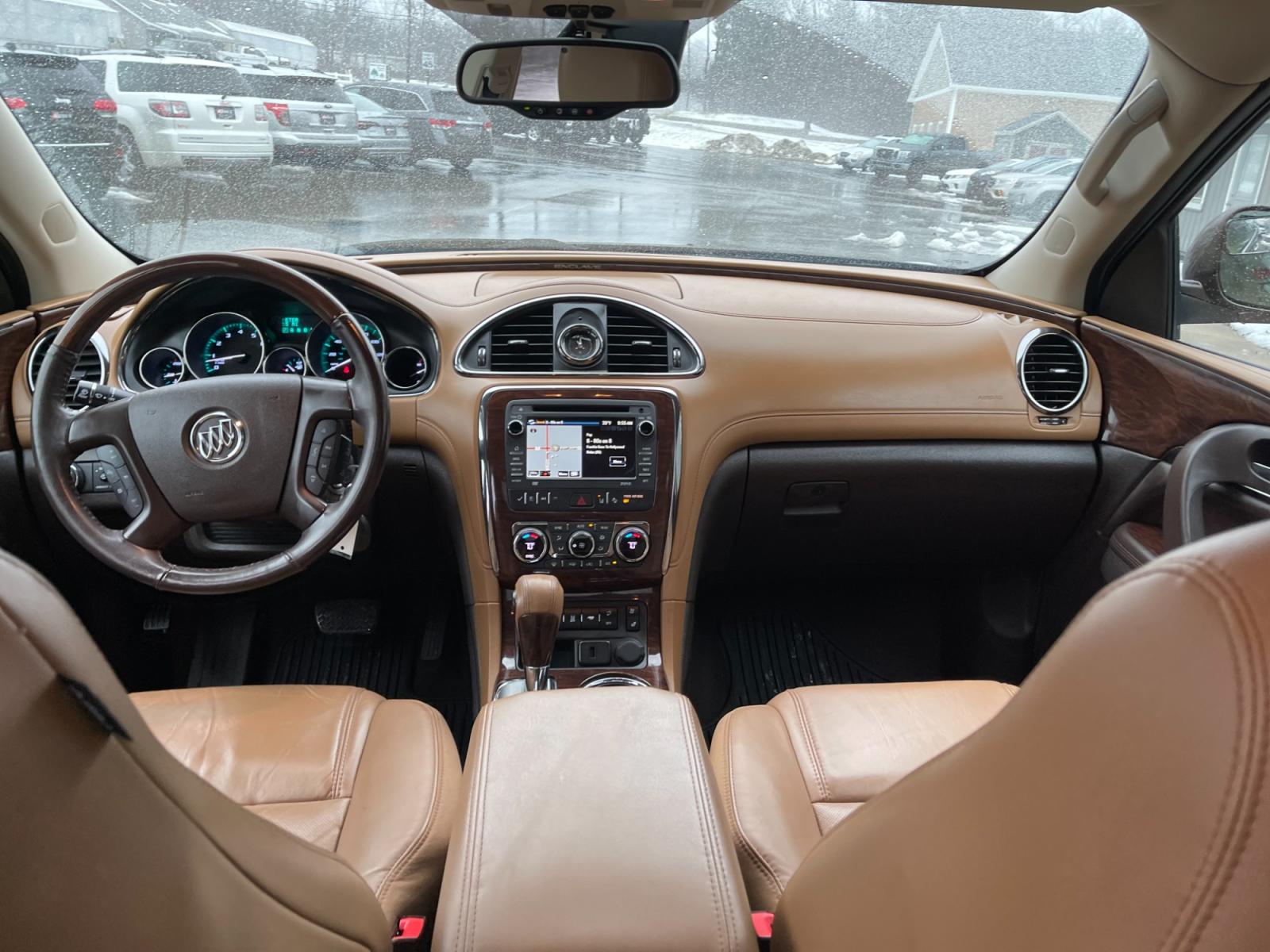 2016 Brown /Brown Buick Enclave Premium AWD (5GAKVCKD4GJ) with an 3.6L V6 DOHC 24V engine, 6A transmission, located at 547 E. Main St., Orwell, OH, 44076, (440) 437-5893, 41.535435, -80.847855 - This 2016 Buick Enclave Premium AWD boasts a luxurious range of features including single-owner status, climate-controlled leather seats, adaptive HID headlights for improved visibility, and safety features like blind spot monitoring and rear cross-traffic alert. Its towing capability is notable at - Photo #43